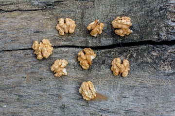 Walnut without shkallupy on a wooden background