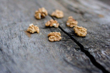 Walnut without shkallupy on a wooden background