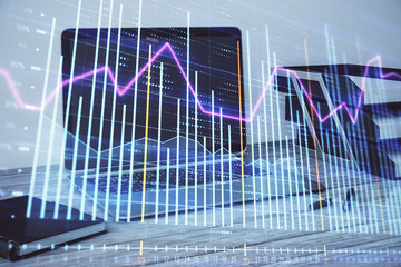 Stock market chart and desktop office computer background. Multi exposure. Concept of financial analysis.