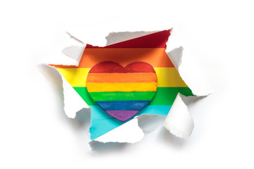 concept of gay pride, LGBT. Hand making heart sign with LGBT gay pride, heart with a rainbow flag