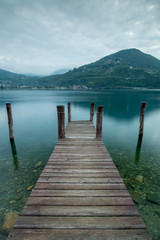 Jetty at lake Orta, Italy in the morning.