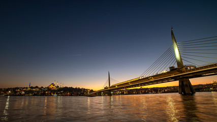 Fototapeta na wymiar Halic Metro Bridge And Golden Horn At Night, Istanbul, Turkey