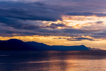 Ocean sunset over mountains in beautiful British Columbia. Canada.