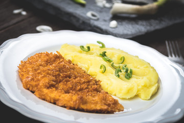 Chicken steak or schnitzel with mashed potatoes
