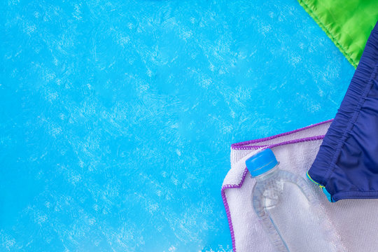 Accessories for swimming pool on a blue background