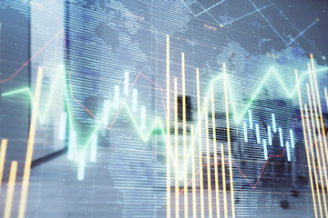 Stock and bond market graph and world map with trading desk bank office interior on background. Multi exposure. Concept of international finance