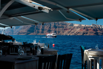 Yachts and sailing boats on the Aegean Sea in the Greek Islands near Santorini Island