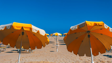 beach umbrellas on a deserted beach