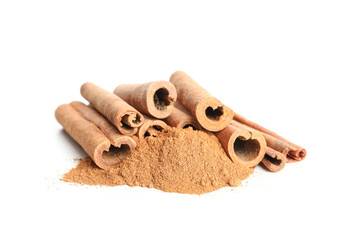 Cinnamon sticks and powder isolated on white background. Sweet spice