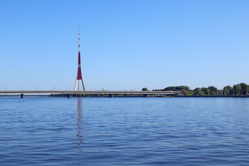 Riga Latvia promenade city center tv tower cityscape tourism view blue bright colors by the river, water landscape