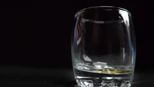 cognac is poured into a stack
