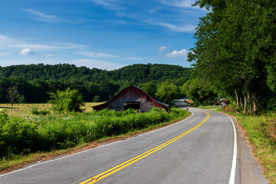 An Old Wood Barn Along A Country Road In Rural Tennessee, USA