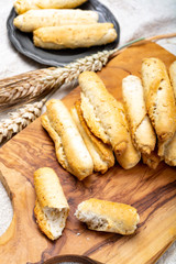 Small italian bread rolls crostini made from wheat dough with sesame