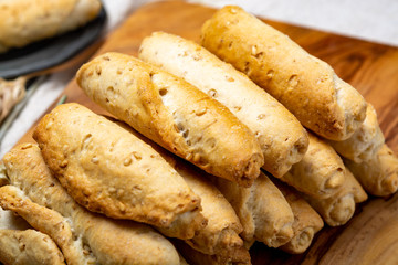 Small italian bread rolls crostini made from wheat dough with sesame