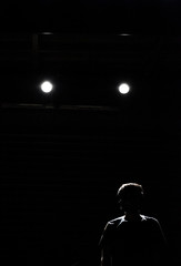 silhouette of a man on black background