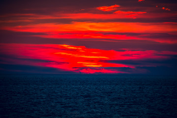 breathtaking sunset on the Adriatic Sea in Montenegro. Soft focus.  Сan be used for postcards, banners, posters, posters, flyers, cards.