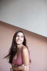 Naklejka premium Gorgeous woman smiling indoors. Lifestyle.