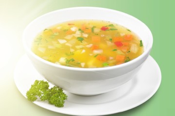 Bowl of delicious vegetables soup on  table