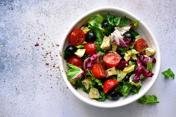 Vegetable salad with grilled chicken. Top view with copy space.