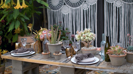 Flowers and kitchen items on the dinning table