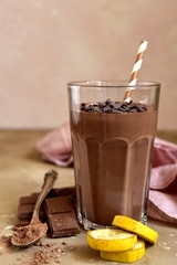 Homemade delicious chocolate banana smoothie for a breakfast.