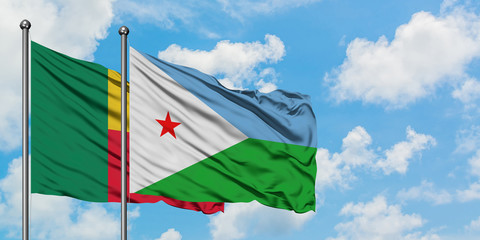 Benin and Djibouti flag waving in the wind against white cloudy blue sky together. Diplomacy concept, international relations.