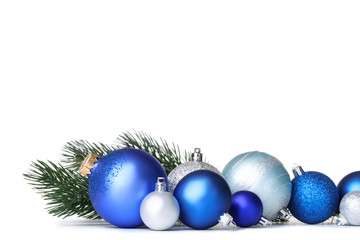 Christmas balls with fir tree branches isolated on white background