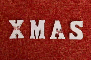 Christmas time banner template on red background. New Year decoration. Xmas white word. Flat-lay. New Year concept.