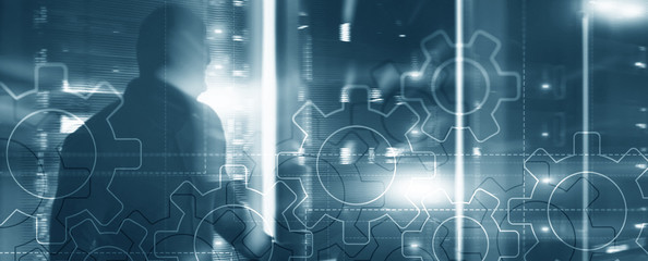 Double exposure gears mechanism on blurred server background. Business and industrial process automation concept