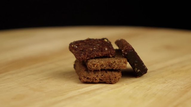 dark rye crackers rotating 360 degrees
