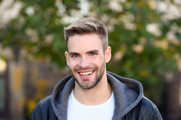 This is what man wants to look like. Happy man on autumn day. Handsome man smile in casual style....