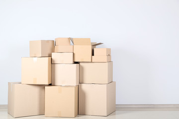 Cardboard boxes on grey background