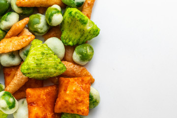 Japanese hot snacks with peas and wasabi on a white plate on the left, on the right - an empty place