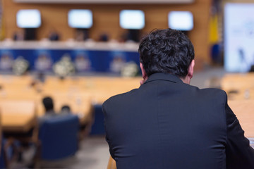 Businessman at business conference room with public giving presentations. Audience at the conference hall. Entrepreneurship club.