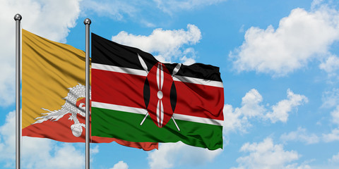 Bhutan and Kenya flag waving in the wind against white cloudy blue sky together. Diplomacy concept, international relations.