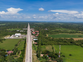 Fototapeta na wymiar Beautiful aerial view of Liberias highway and town in Costa Rica