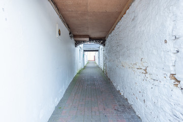 Obraz premium street tunnel in village