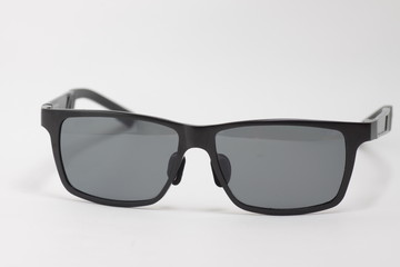 Black sunglasses on a white background