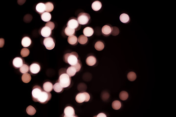 bokeh lights on a black background.