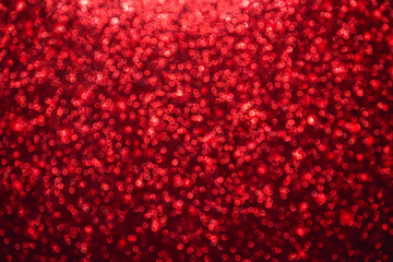Red bokeh abstract christmas background. Defocused background.