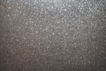 Silver and gray glitter with bokeh background. Glitter and Christmas abstract background.