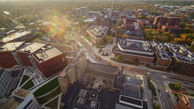 Ann Arbor Michigan Aerial v26 Panning birdseye of downtown campus at sunrise near University Ave between Church and Fletcher Streets - October 2017