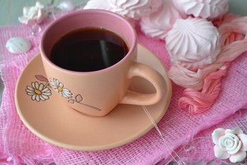 Airy vanilla zephyr or Russian marshmallow with pink cup of coffee on vintage napkin. Still life card