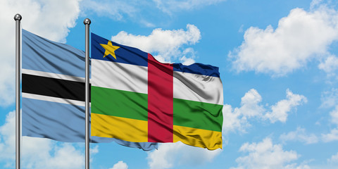 Botswana and Central African Republic flag waving in the wind against white cloudy blue sky together. Diplomacy concept, international relations.