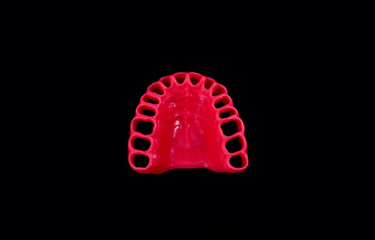 model of human gums without teeth isolated on black