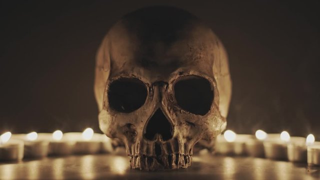 Skull with smoke and candles Prores 4444 footage