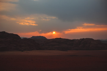Fototapeta na wymiar Sunset in the desert of Wadi Rum, Jordan