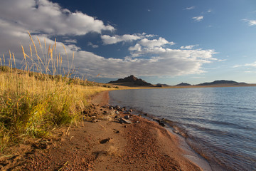 Cloudy view on a mountain lake. Mongolia