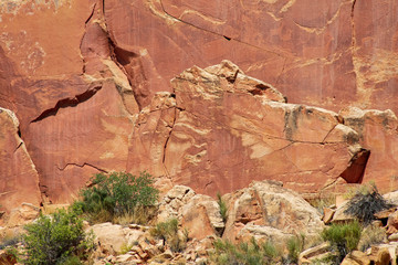 Ancient Fremont People petroglyphs make present day visitor aware of their existence oin the sandstone walls of Capitol Reef National Park, Utan