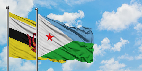 Brunei and Djibouti flag waving in the wind against white cloudy blue sky together. Diplomacy concept, international relations.